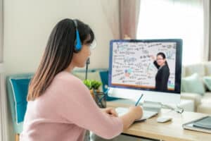 difference between cna and medical assistant woman writing