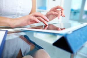 medical scribe role key responsibilities explained hand in tablet