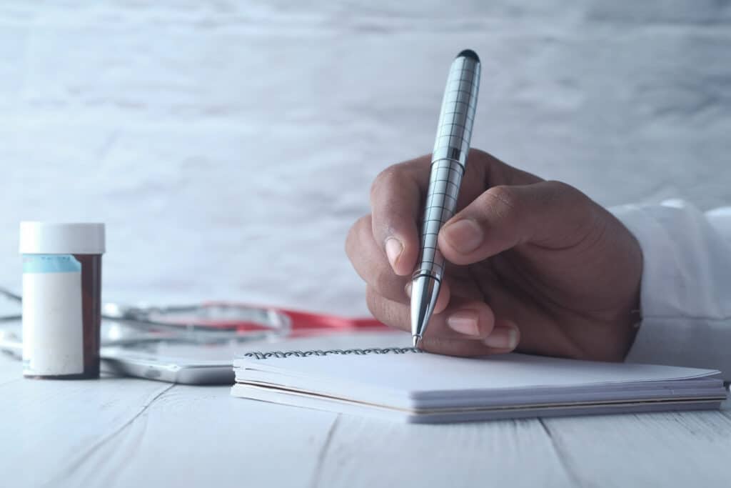medical scribe role key responsibilities explained hand writing