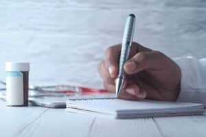 medical scribe role key responsibilities explained hand writing