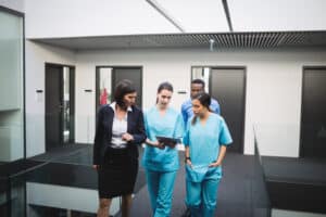 the rise of virtual assistant nurses doctors looking at the tablet