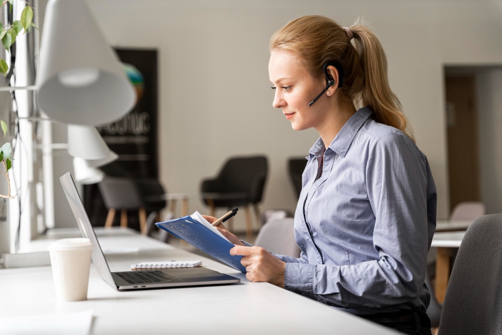 Executive Assistant and General Virtual Assistant woman in front of laptop