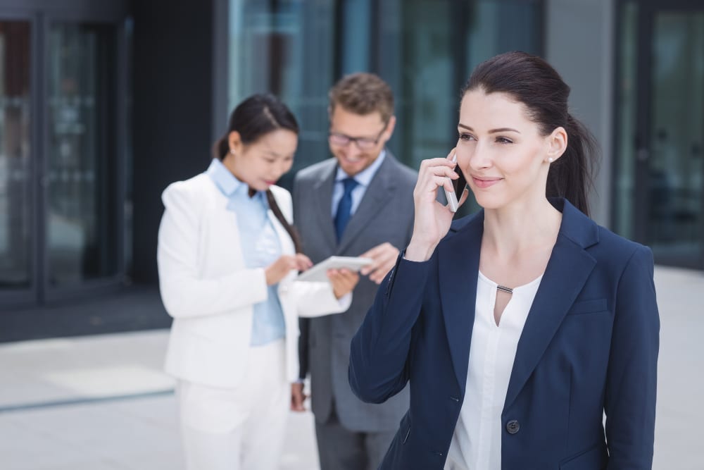 Real Estate Cold Callers and Appointment Setters woman calling on cellphone