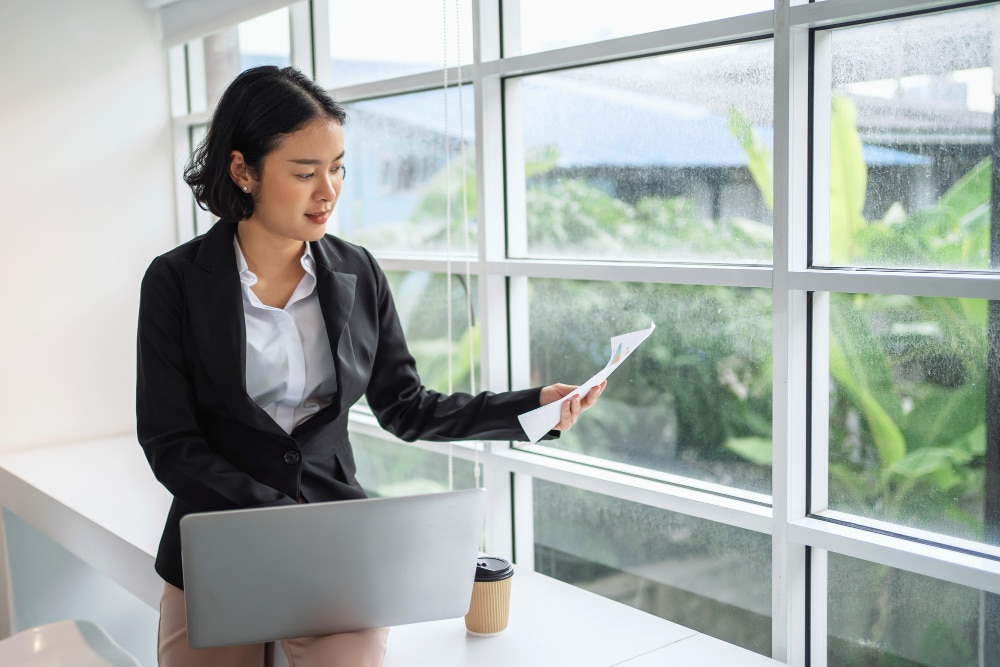 woman with laptop on her lap