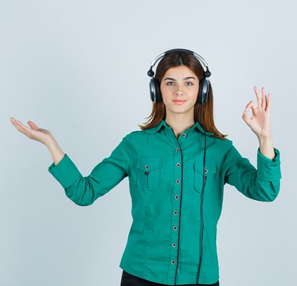 woman standing signing okay and other side