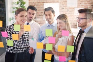 25 executive assistant skills what to look for in your hire Business team collaborating in office