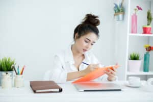 appointment setter position Young professional reviewing documents