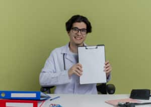 Doctor with clipboard highlights Medical Scribe Employment.
