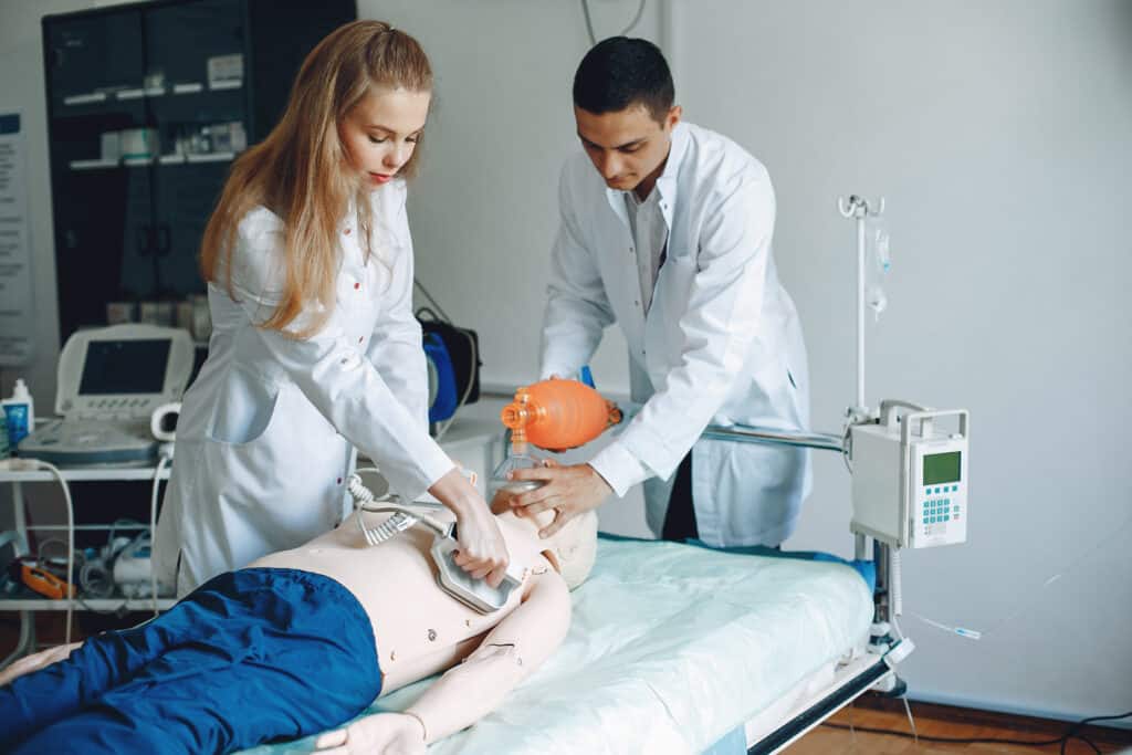 basic life support for healthcare provider, two doctor perform a revival demo
