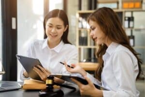 outbound appointment setters, two women discussing the patients concerns
