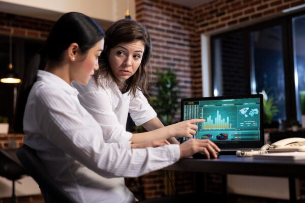 two women monitoring the data's