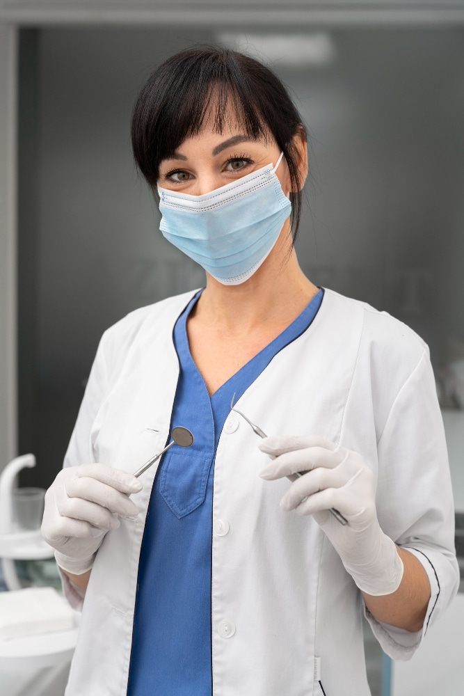 dental staff facing in camera