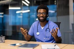 Healthcare professional managing referral intake readiness for high-intent patient inquiries during a virtual consultation.