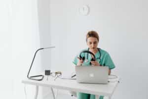 Healthcare professional preparing to address delayed responses as part of medical practice reputation recovery.