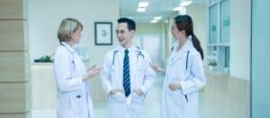 Healthcare team coordinating patient feedback through medical review response routing for practice reputation.